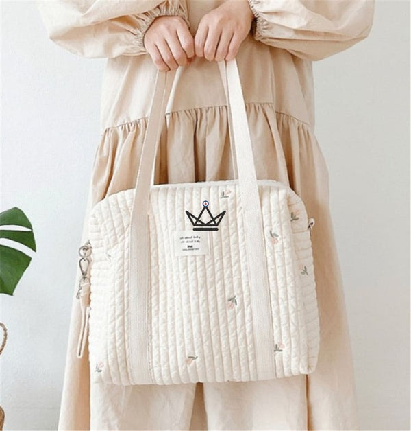 sac maternité a langer bandoulière pour poussette liste de naissance motif olive grande taille main