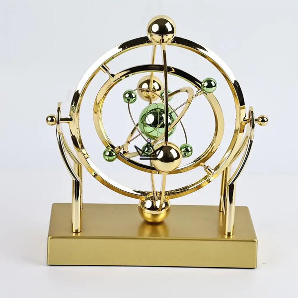 Sculpture cinétique de bureau orbite céleste dorée - ASTRALIS